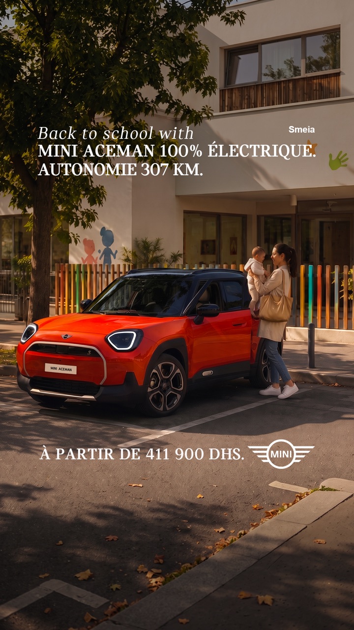 Back to school with MINI Aceman 100% électrique. Autonomie 307 km. À partir de 411 900 DHS. MINI · Smeia. Une Aceman orange-rouge devant une école.
