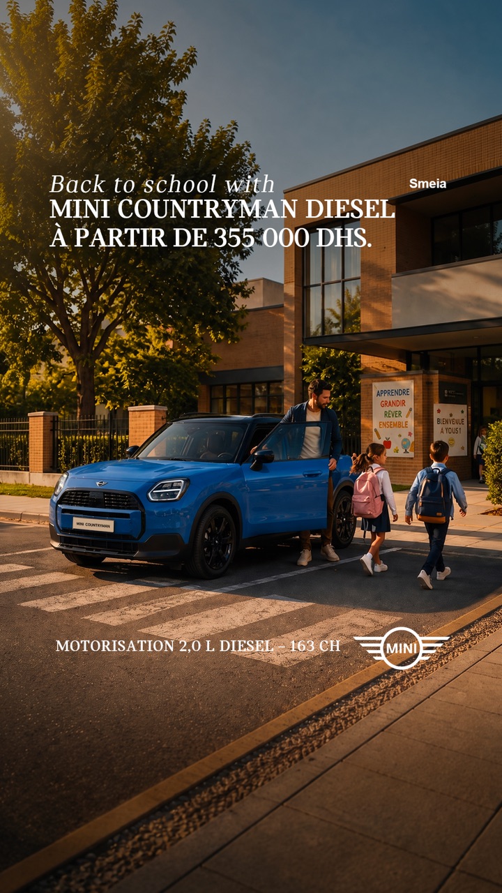 Back to school with MINI Countryman Diesel. À partir de 355 000 DHS. Motorisation 2,0 L diesel · 163 ch. MINI · Smeia. Un Countryman bleu devant une école.
